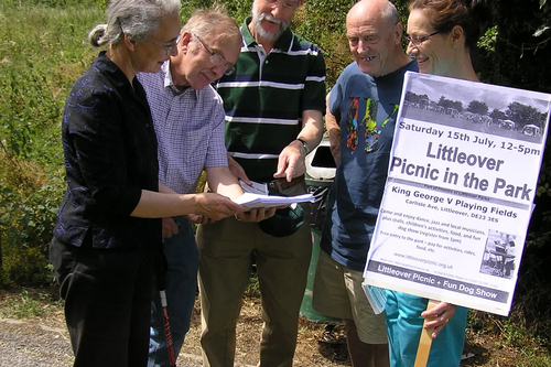 Cllrs Lucy Care, Eric Ashburner and Mike Carr with Nigel Staunton (centre) and Mandy Packham of Friends of Littleover Parks with a copy of the council report releasing the funding.